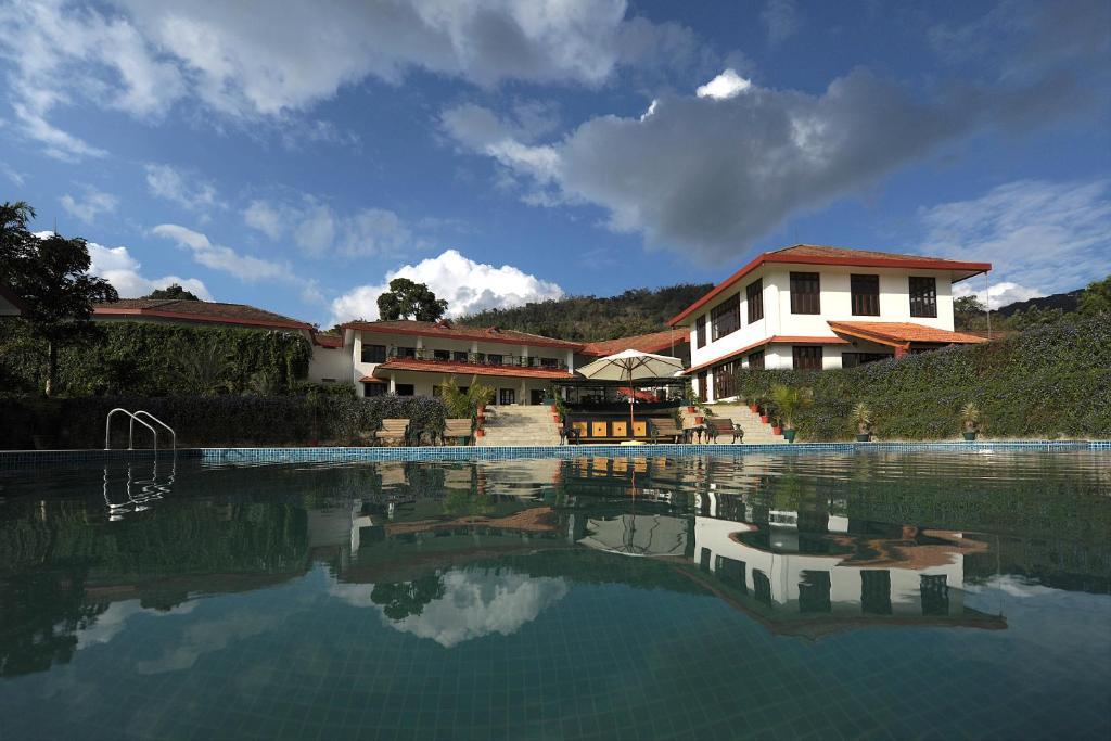 Amritara Ambatty Greens Resort Virajpet Exterior foto